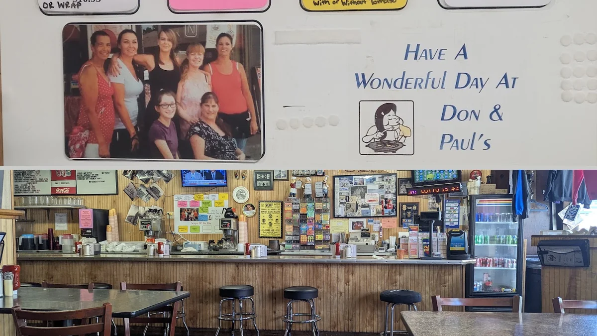 A homey diner interior with booth seating.